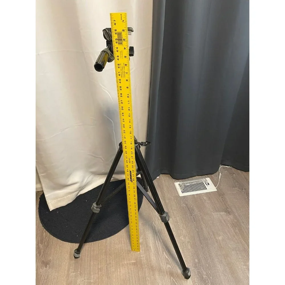 Slik Universal U-112 Tripod extends from 22